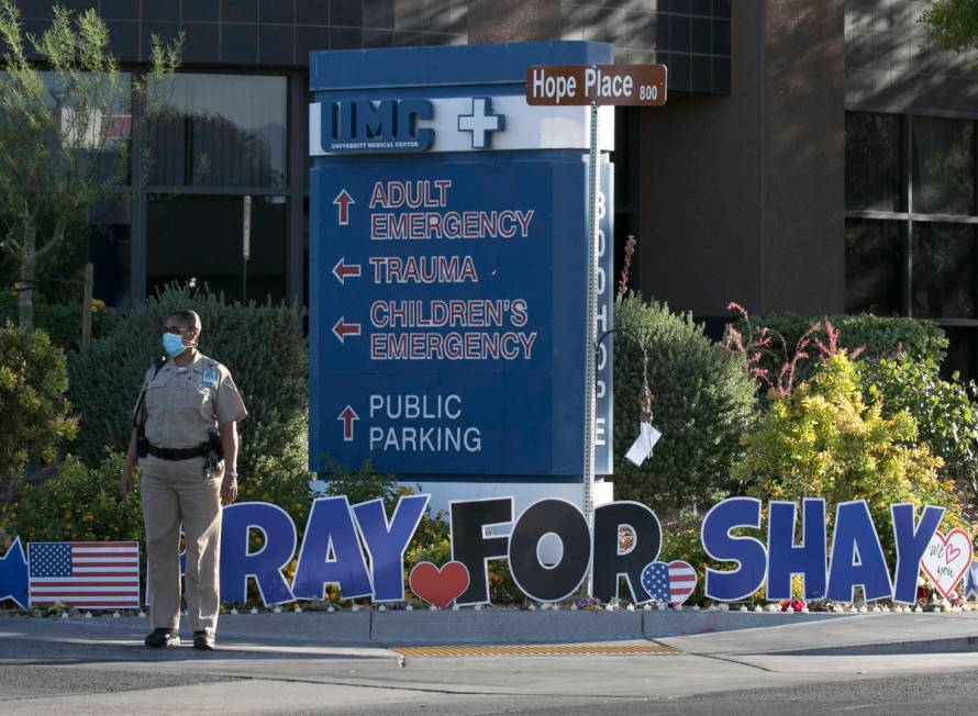 A University Medical Center (UMC) police officer stand guard outside the hospital during A &quo ...