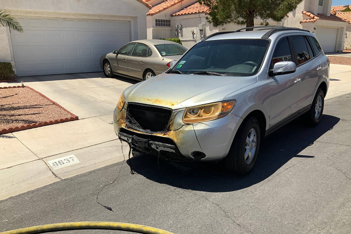 Crews investigate a fire Sunday, June 7, 2020, on the 6600 block of Lund Drive in Las Vegas. (L ...