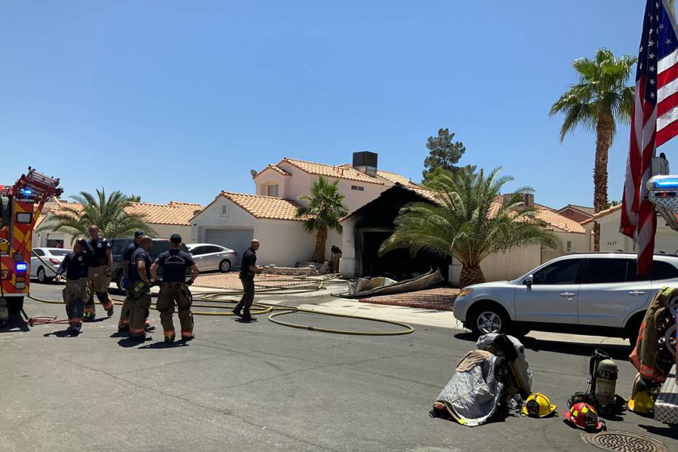 Crews investigate a fire Sunday, June 7, 2020, on the 6600 block of Lund Drive in Las Vegas. (L ...