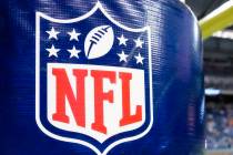 FILE - This Aug. 9, 2014 file photo shows an NFL logo on a goal post pad before a preseason NFL ...