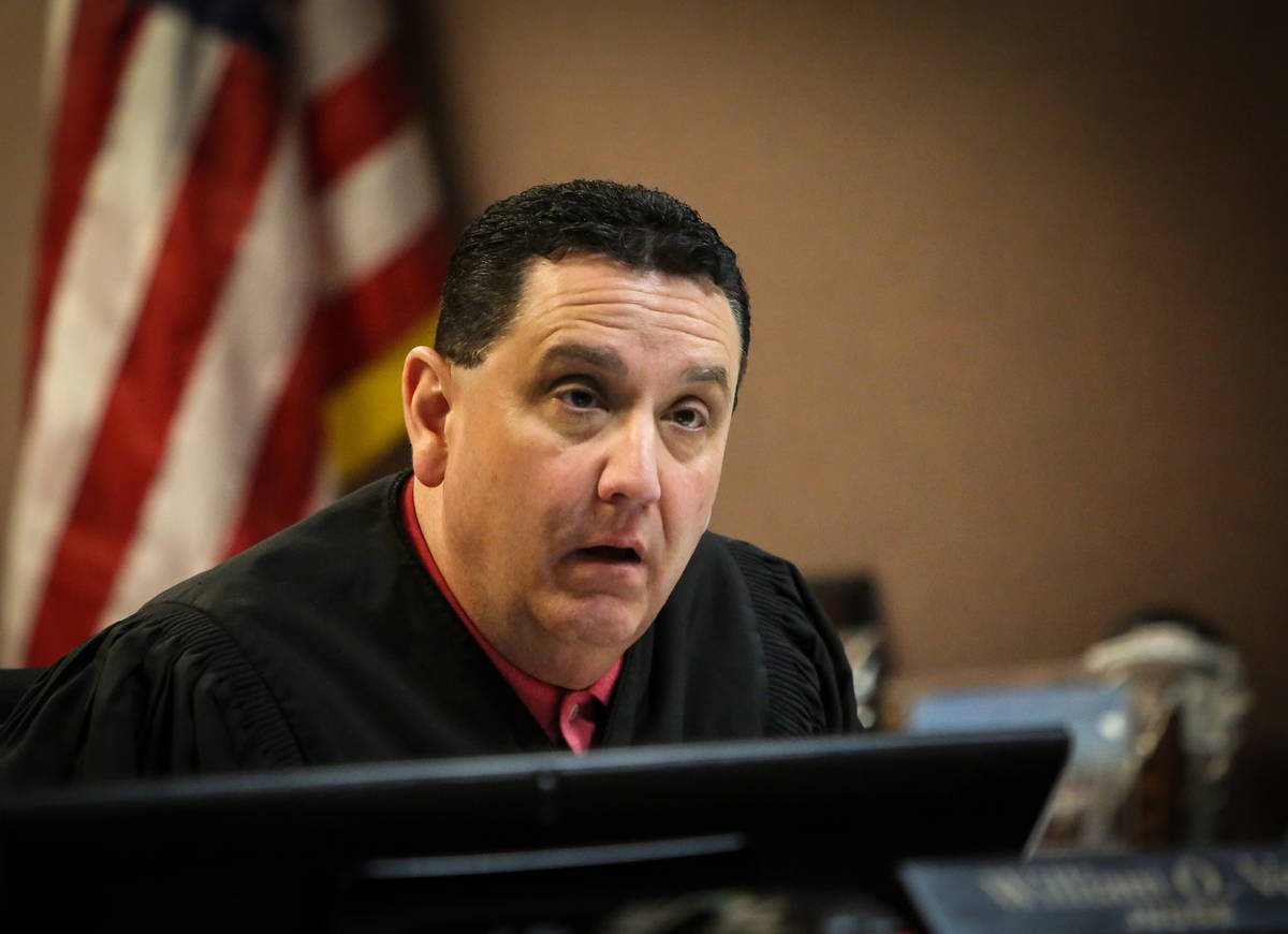 Judge William O. Voy presides over the case at the Family Courts and Services Center in Las Veg ...