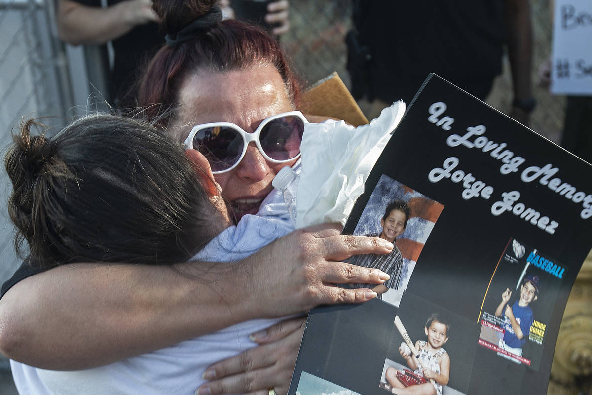 Jeannie Llera, right, mother of Jorge Gomez, who was fatally shot last week by Las Vegas police ...