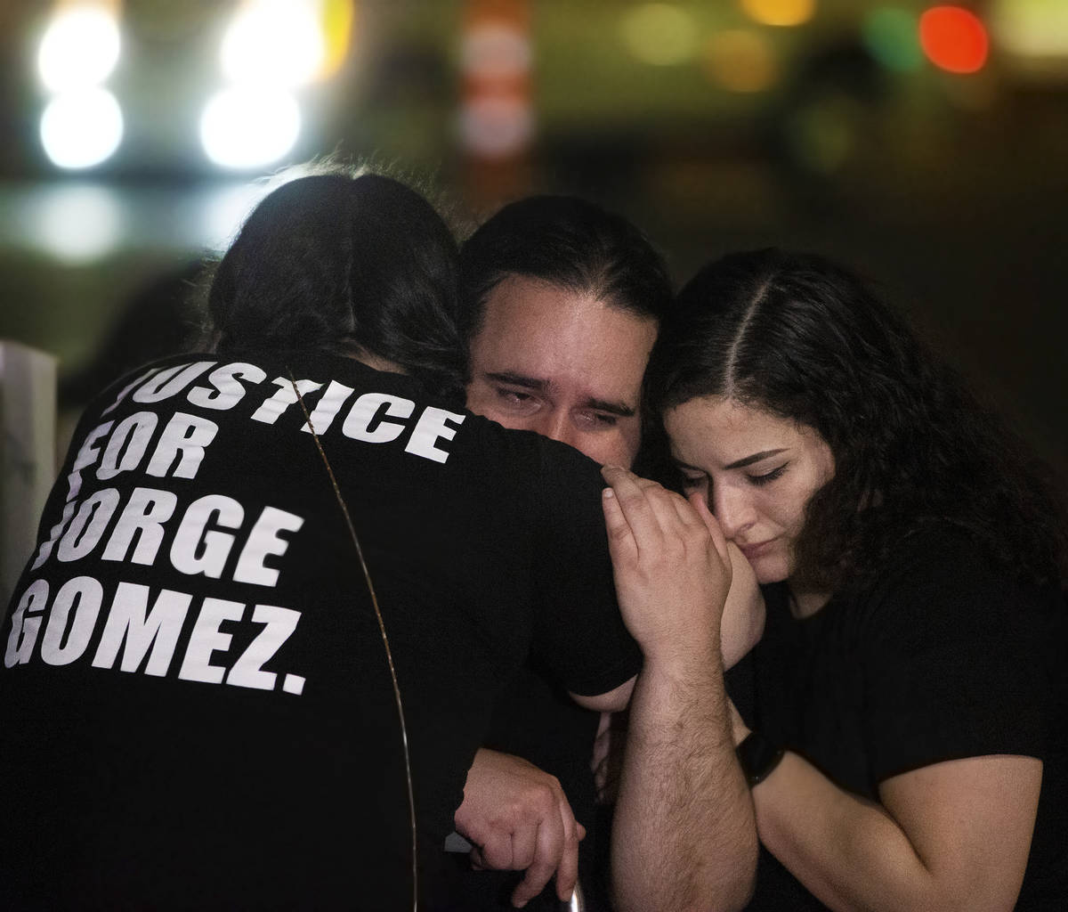 Emotions ran high during a vigil in front of City Hall for Jorge Gomez, the man who was fatally ...