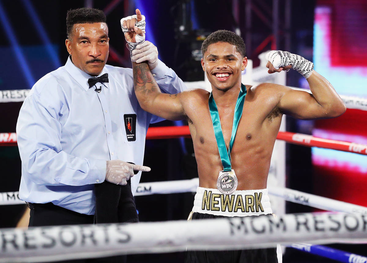 Shakur Stevenson celebrates his victory over Felix Caraballo in their super featherweight fight ...