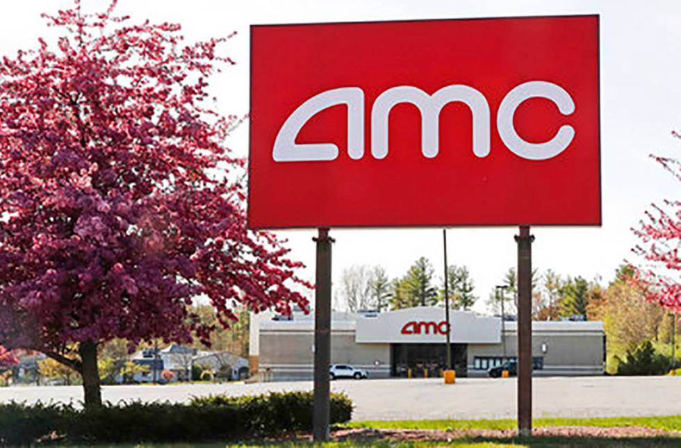 This May 14, 2020, photo shows an AMC theater sign at a nearly empty parking lot for the theate ...