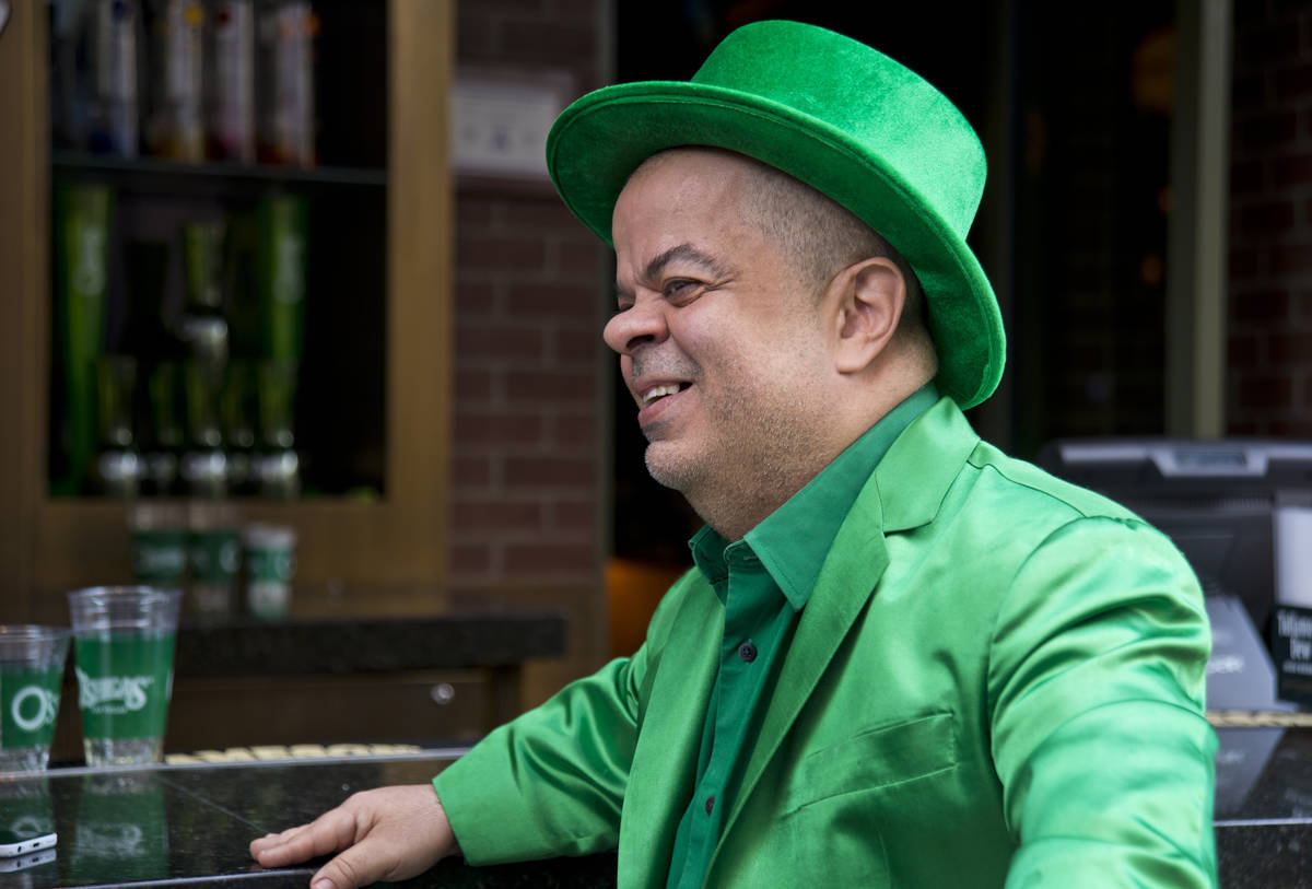 Brian Thomas, O'Sheas Casino manager and resident leprechaun, answers questions during an inter ...