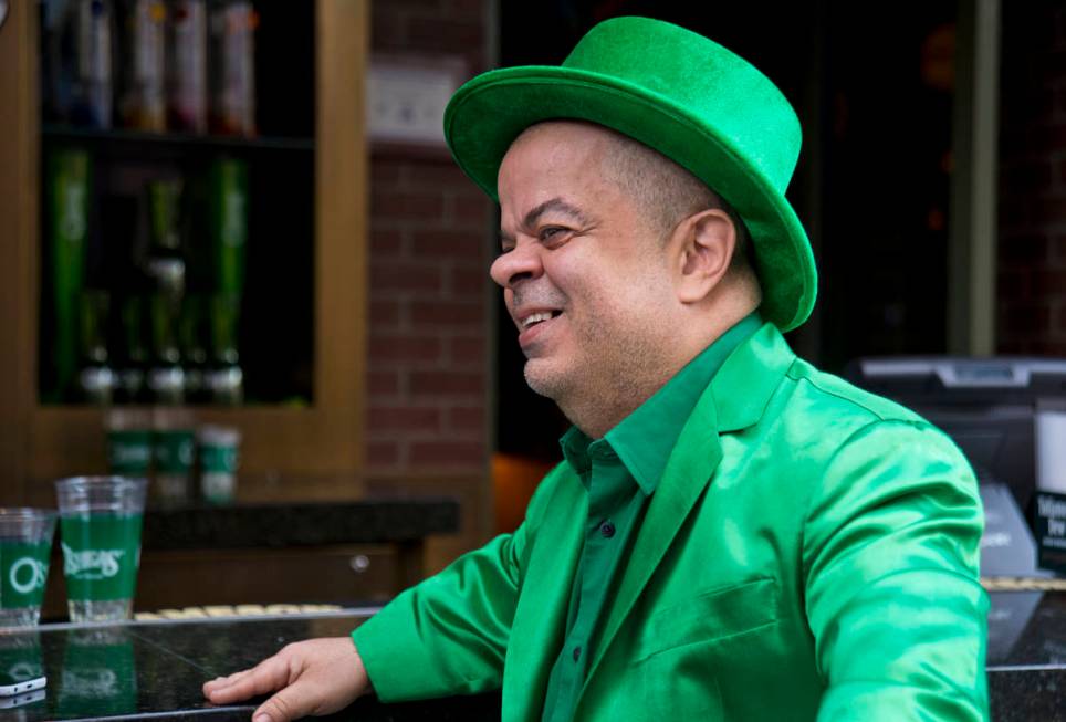 Brian Thomas, O'Sheas Casino manager and resident leprechaun, answers questions during an inter ...