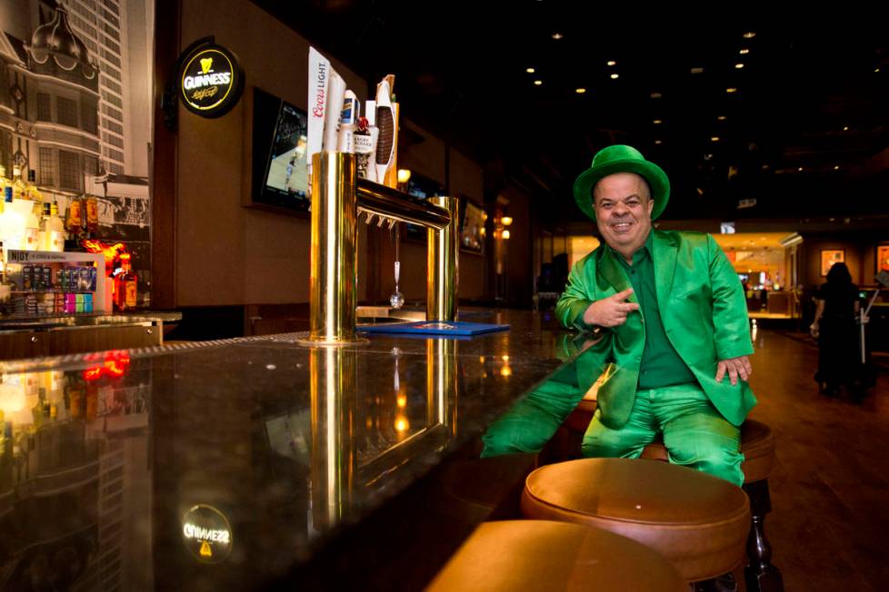 Brian Thomas, O'Sheas Casino manager and resident leprechaun, poses for a photograph inside the ...