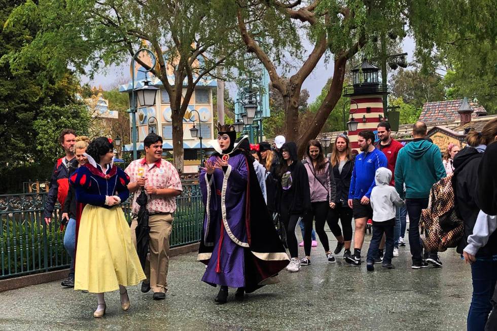 A visitor around at Disneyland in Anaheim, Calif. on Friday, March 13, 2020. Disneyland is clos ...