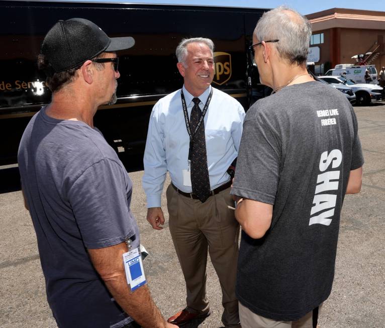 Frank Mikalonis, uncle of Las Vegas police officer Shay Mikalonis, right, and Shay's step-fathe ...