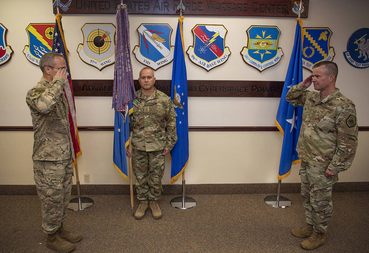 Major Gen. Charles Corcoran, United States Air Force Warfare Center Commander, returns a salute ...