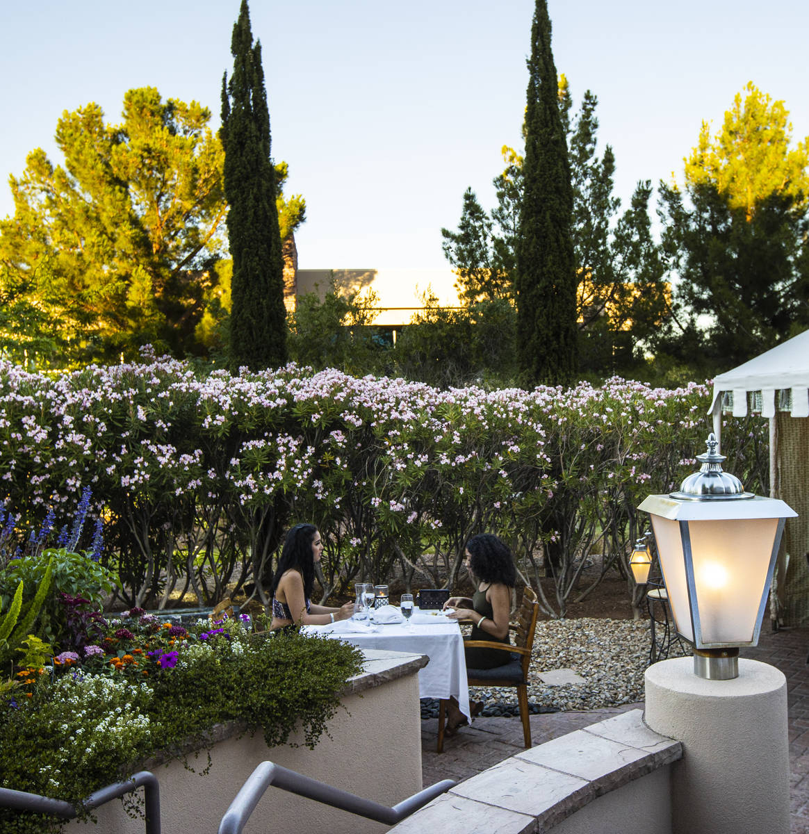 People dine outdoors at Vintner Grill in Las Vegas on Wednesday, June 10, 2020. (Chase Stevens/ ...