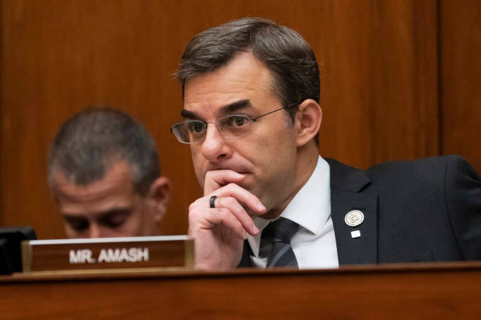 In this June 12, 2019, file photo, Rep. Justin Amash, R-Mich., listens to debate on Capitol Hil ...