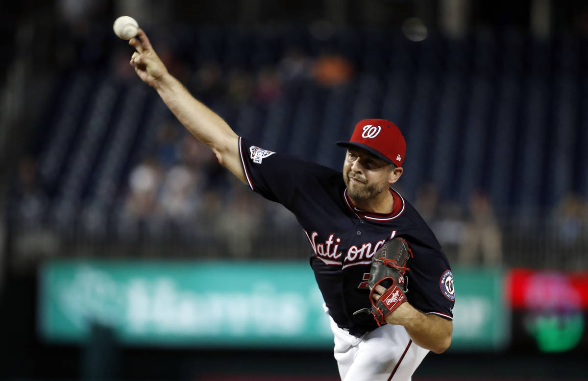 Washington Nationals relief pitcher Brandon Kintzler (21) throws during a baseball game against ...