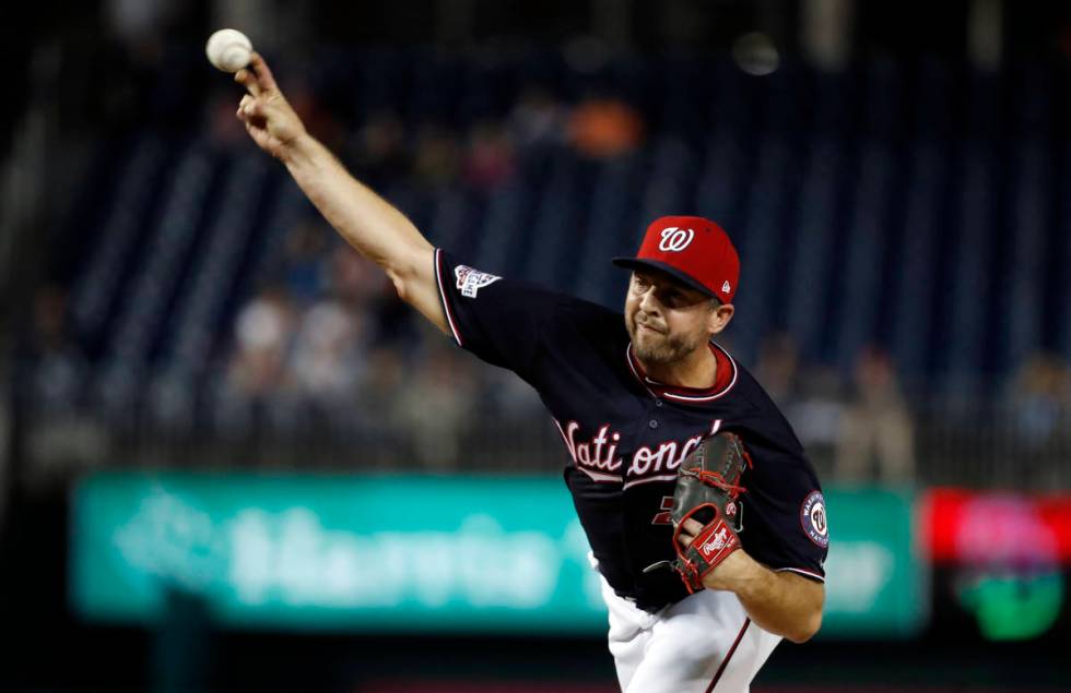 Washington Nationals relief pitcher Brandon Kintzler (21) throws during a baseball game against ...