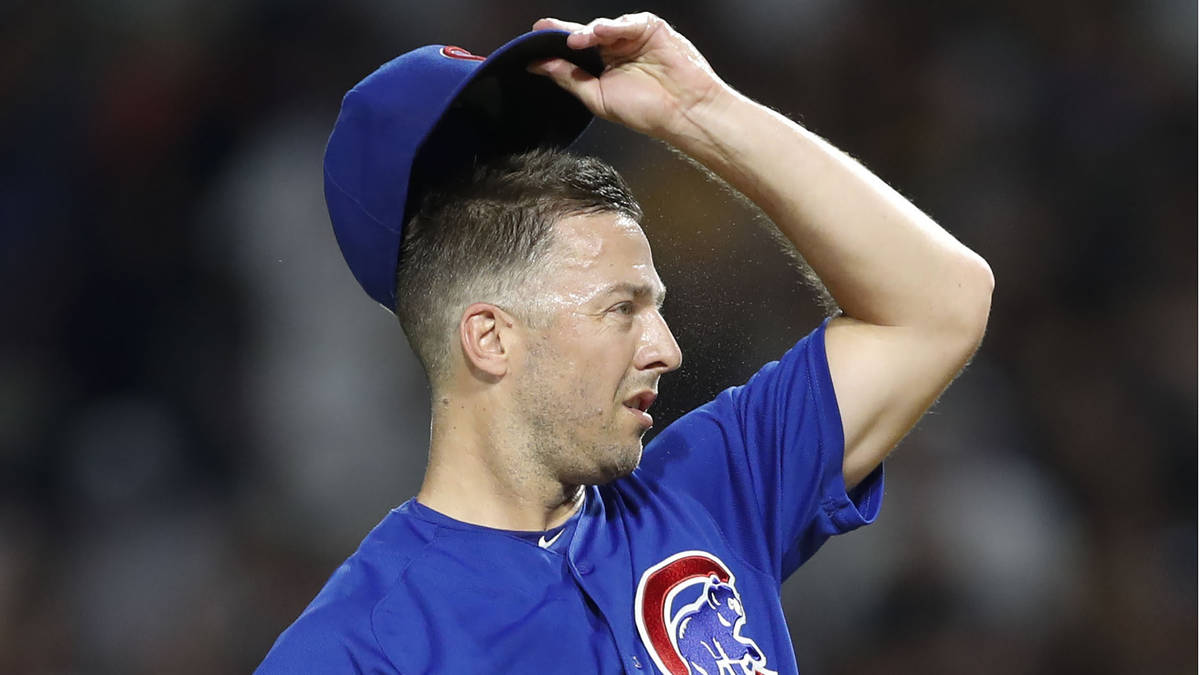 Chicago Cubs relief pitcher Brandon Kintzler reacts after walking Pittsburgh Pirates pinch hitt ...