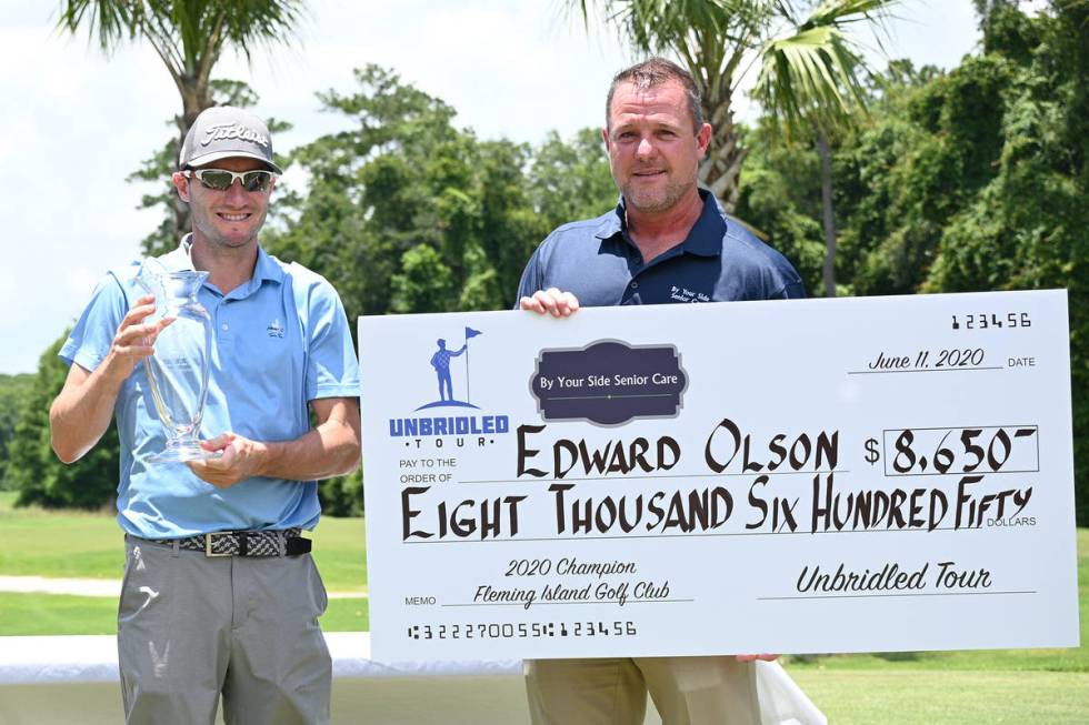 Former UNLV standout Eddie Olson, left, shot a course-record 60 at Fleming Island Golf Club on ...