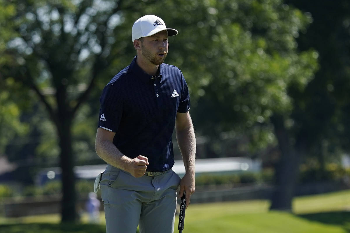 Daniel Berger pumps his fist after a birdie putt on the 18th hole during the final round of the ...