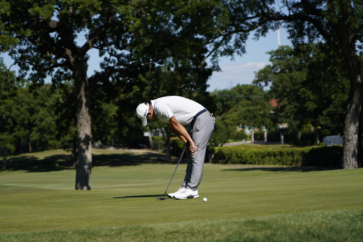 Coilin Morikawa misses a putt on the 17th green during a playoff round at the Charles Schwab Ch ...