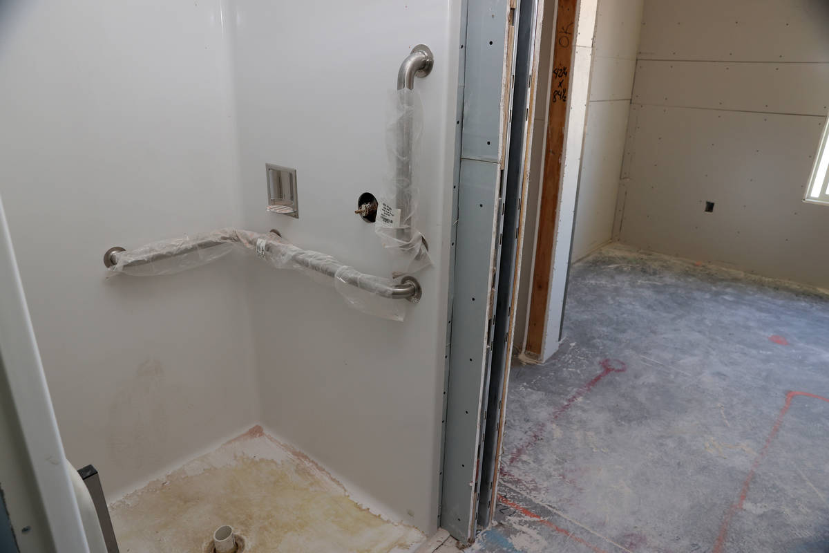 An Americans with Disabilities Act accessible bathroom in construction in one of the units of t ...