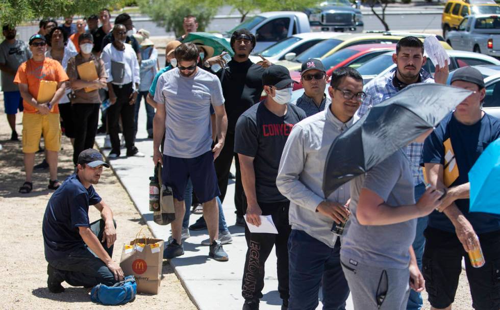 One persone waiting in line at the Nevada Department of Motor Vehicles at 8250 West Flamingo Ro ...