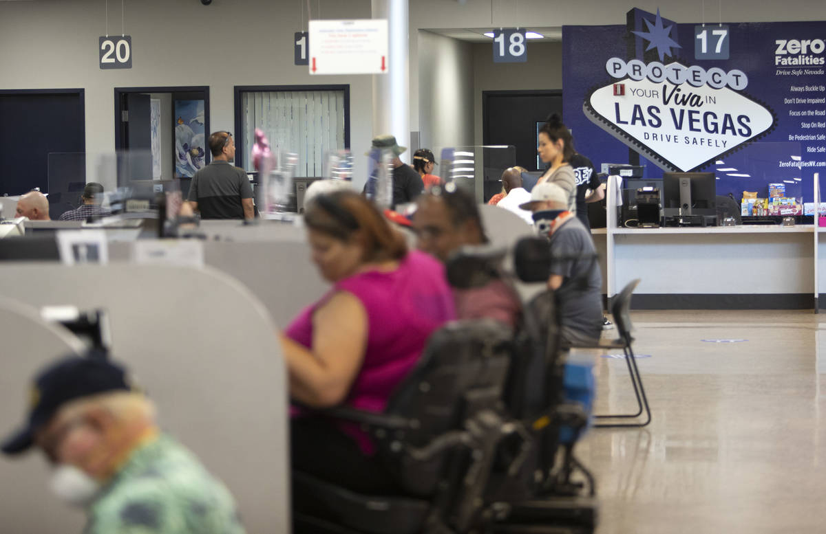 The Nevada Department of Motor Vehicles at 8250 West Flamingo Road has extremely long lines as ...