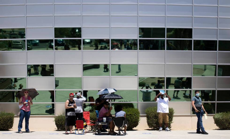 The Nevada Department of Motor Vehicles at 8250 West Flamingo Road has extremely long lines as ...