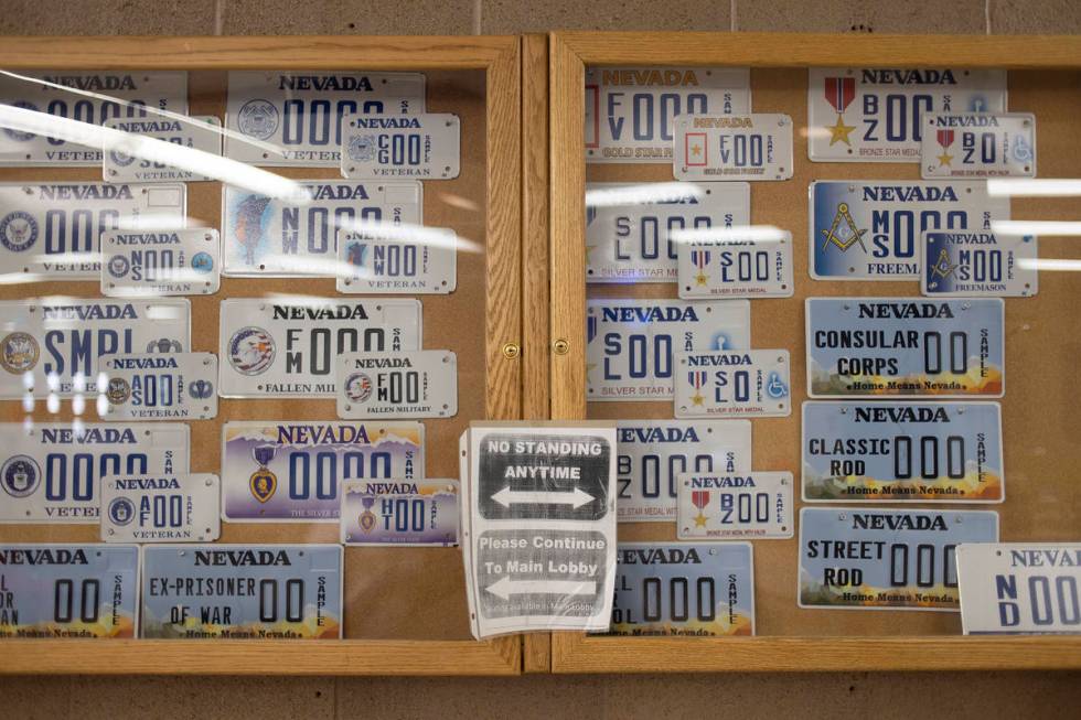 A sign asks patrons to move to the main lobby at the Nevada Department of Motor Vehicles at 825 ...