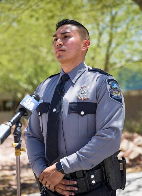 Nevada Highway Patrol Trooper Rafael Rodriguez speaks to the media about how he saved a woman w ...