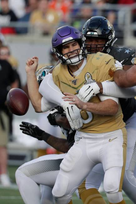 AFC defensive end Calais Campbell, of the Jacksonville Jaguars, (93) sacks NFC quarterback Kirk ...