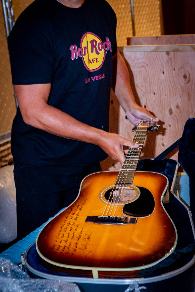 Johnny Cash’s autographed Martin guitar is one of the items taken out of the Hard Rock Hotel ...