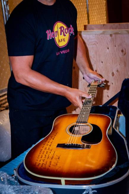 Johnny Cash’s autographed Martin guitar is one of the items taken out of the Hard Rock Hotel ...