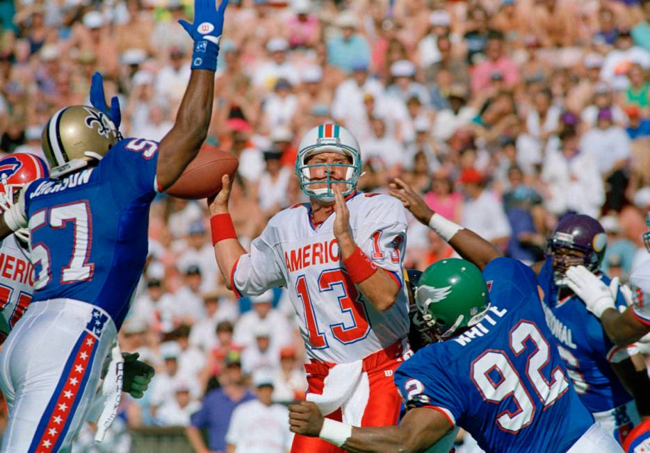 This Feb. 7, 1993, file photo shows Miami Dolphins quarterback Dan Marino (13) of the AFC squad ...