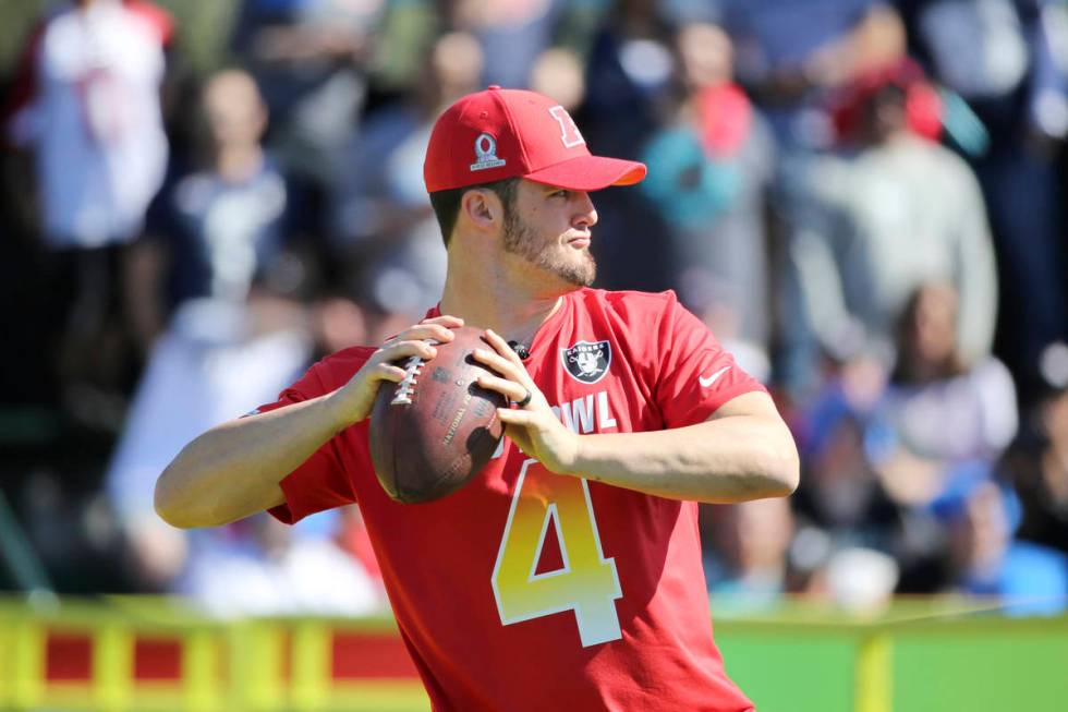 AFC quarterback Derek Carr of the Oakland Raiders warms up before the Precision Passing Event d ...