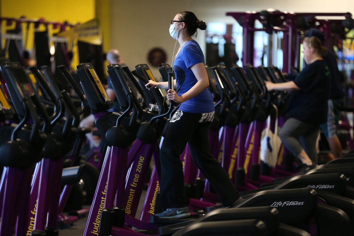 People workout at the Planet Fitness gym in Las Vegas, Tuesday, June 16, 2020. (Erik Verduzco / ...