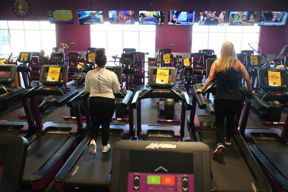 People workout at the Planet Fitness gym in Las Vegas, Tuesday, June 16, 2020. (Erik Verduzco / ...