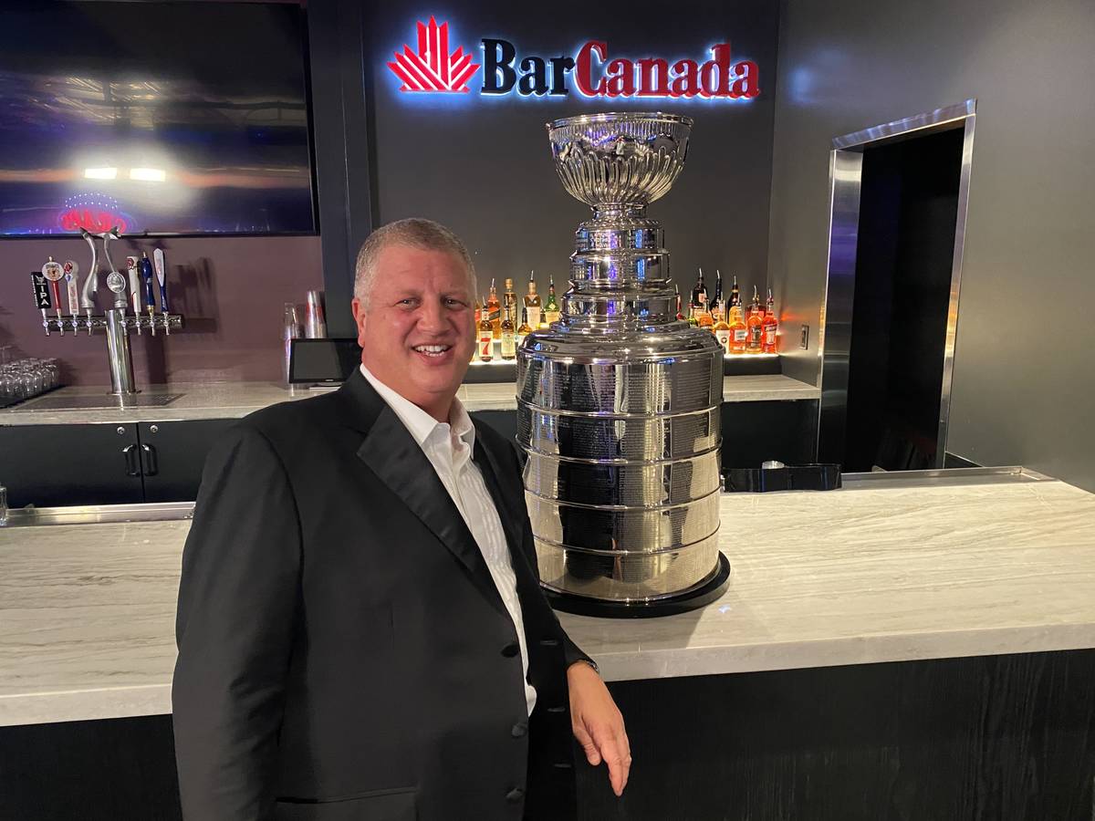 The D Las Vegas co-owner Derek Stevens poses with a replica Stanley Cup at BarCanada on Wednesd ...