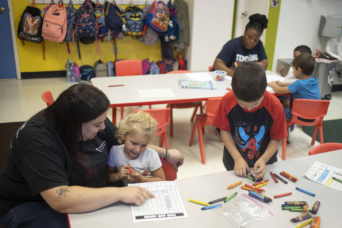 Miss Rebecca works on spelling with Ava at Rising Star Preschool & Childcare on Monday, Jun ...