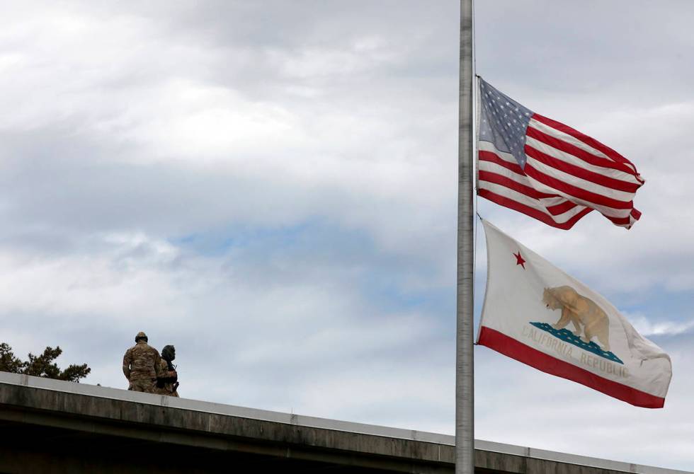 Flags fly at half-staff above the Santa Cruz County Courthouse on Friday, June 12, 2020 for San ...