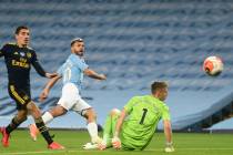 Manchester City's Sergio Aguero, center, in action during the English Premier League soccer mat ...
