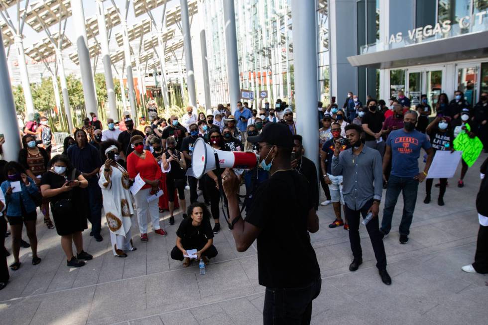 The Rev. Stretch Sanders speaks to protesters at an NAACP protest on Wednesday, June 17, 2020, ...