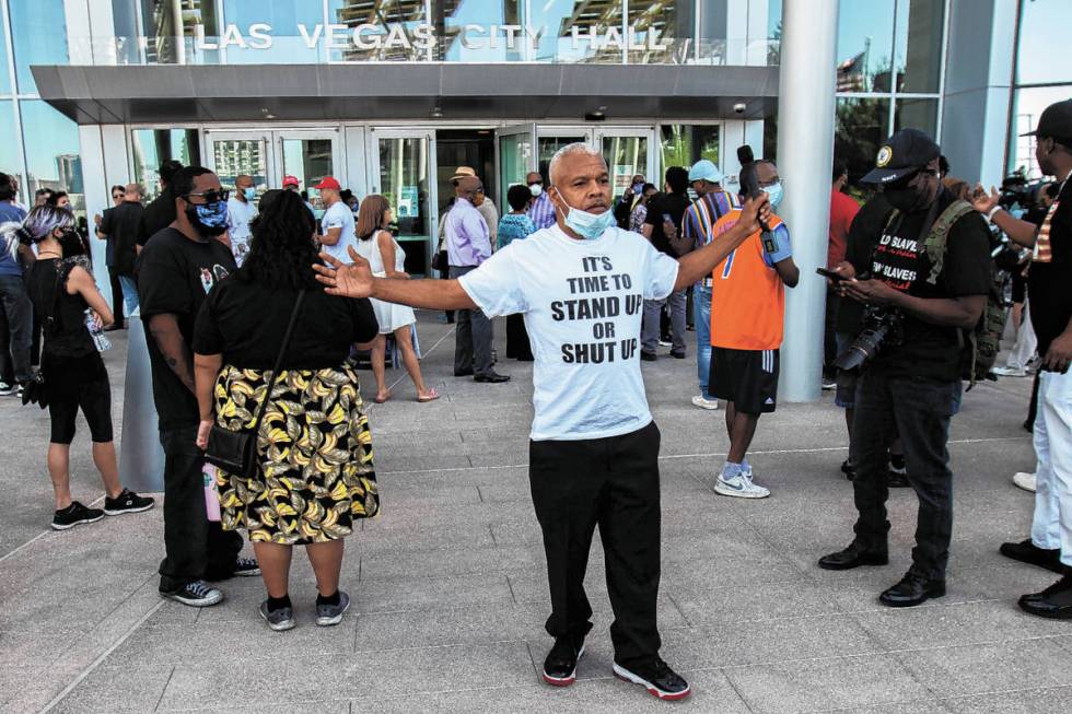 Henry Thorns gives an interview at an NAACP protest in front of Las Vegas City Hall to address ...