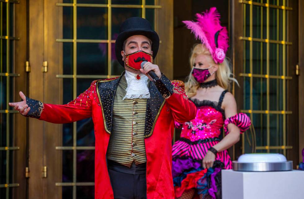 A Monsieur Loyal ringmaster greets those gathered outside the entrance of the Paris Las Vegas t ...