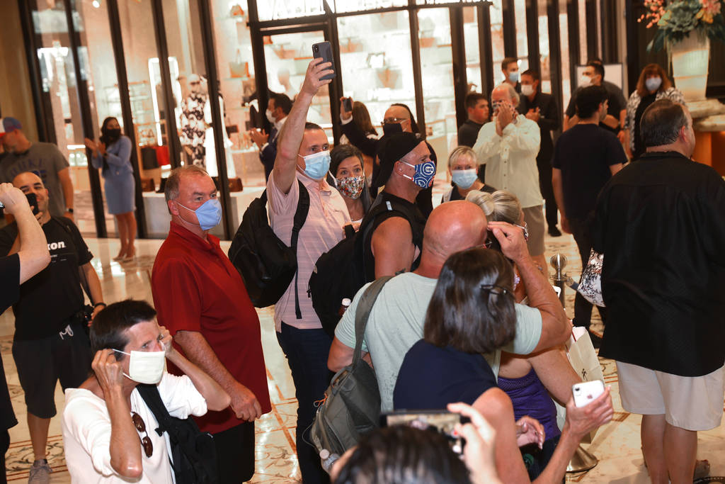 The first guests arrive at the Bellagio on the Las Vegas as the resort reopens after 78 days sh ...