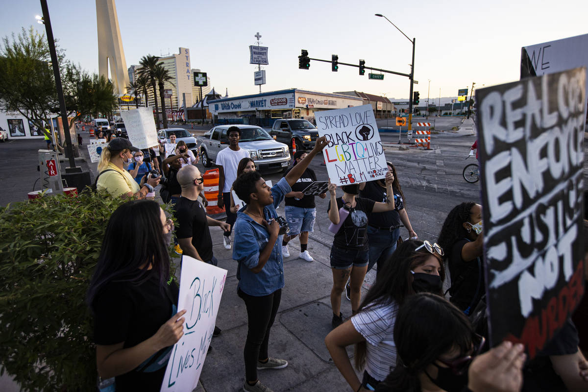 People participate in a Black Lives Matter protest along Las Vegas Boulevard on Wednesday, June ...