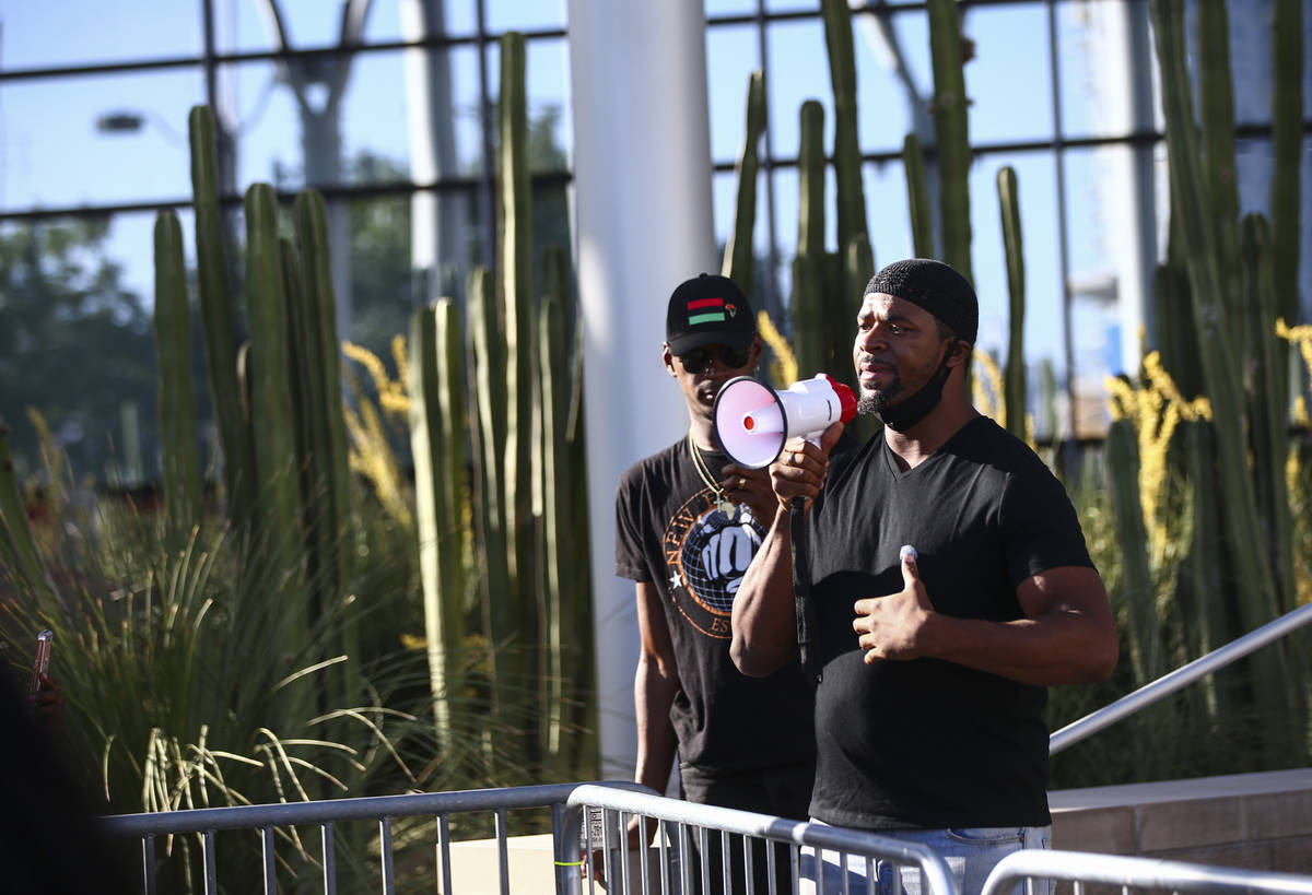 Vaughn Sanders speaks during a Black Lives Matter protest outside of Las Vegas City Hall on Wed ...