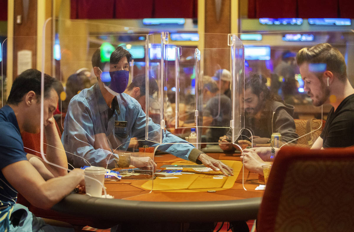 The Bellagio poker room is packed after being outfitted with shielding and upgraded sanitation ...