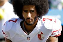 In this Sept. 25, 2016, file photo, San Francisco 49ers quarterback Colin Kaepernick kneels dur ...