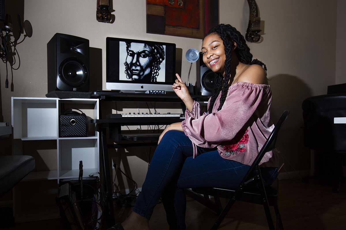 A'Kaeila Coulter, a student at Leadership Academy of Nevada, points at a drawing of Yaa Asantew ...