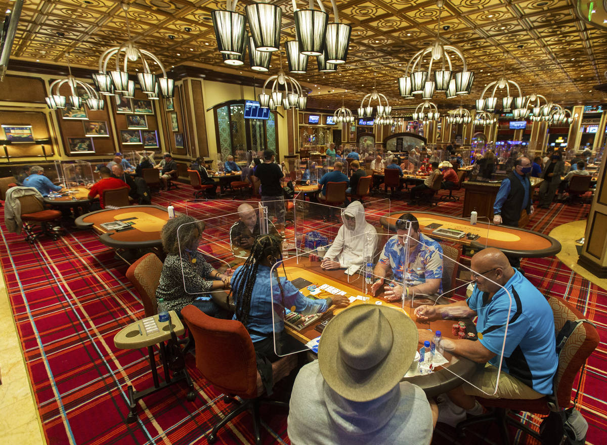 The Bellagio poker room is packed after being outfitted with shielding and upgraded sanitation ...